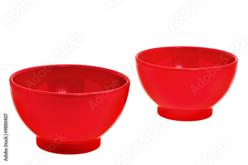 two red soup cups on white background