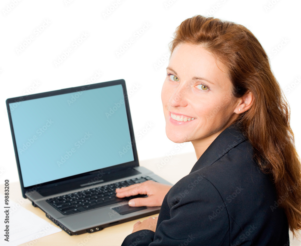 Portrait of charming woman sitting in front of laptop Portrait of charming woman sitting in front of laptop
