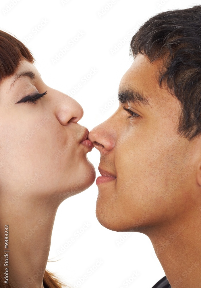 Kiss. Happy loving couple on a white background Kiss. Happy loving couple on a white background
