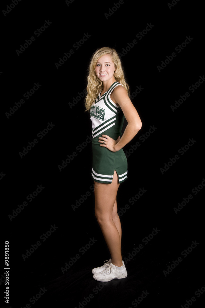 beautiful blond cheerleader in uniform, isolated beautiful blond cheerleader in uniform, isolated