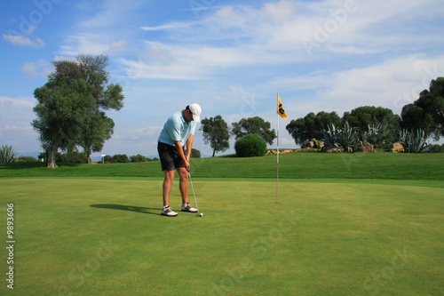 Golf - Golfer auf dem Green beim Putten