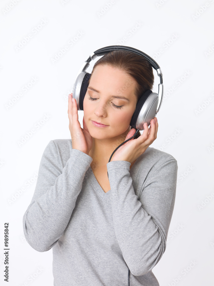 Portrait of beautiful young woman with headphones Portrait of beautiful young woman with headphones