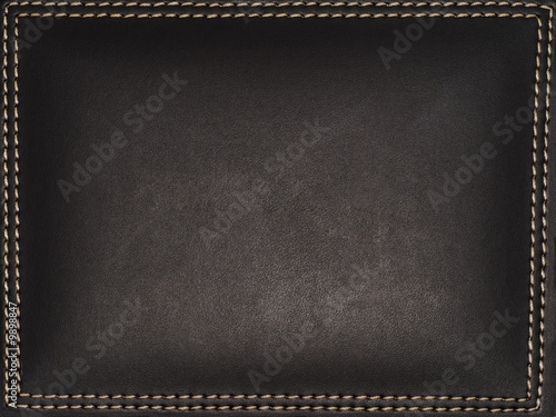A dark leather frame with surrounding stitches