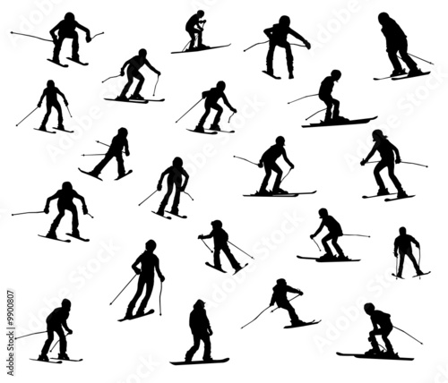 Twenty one silhouette of skiers.