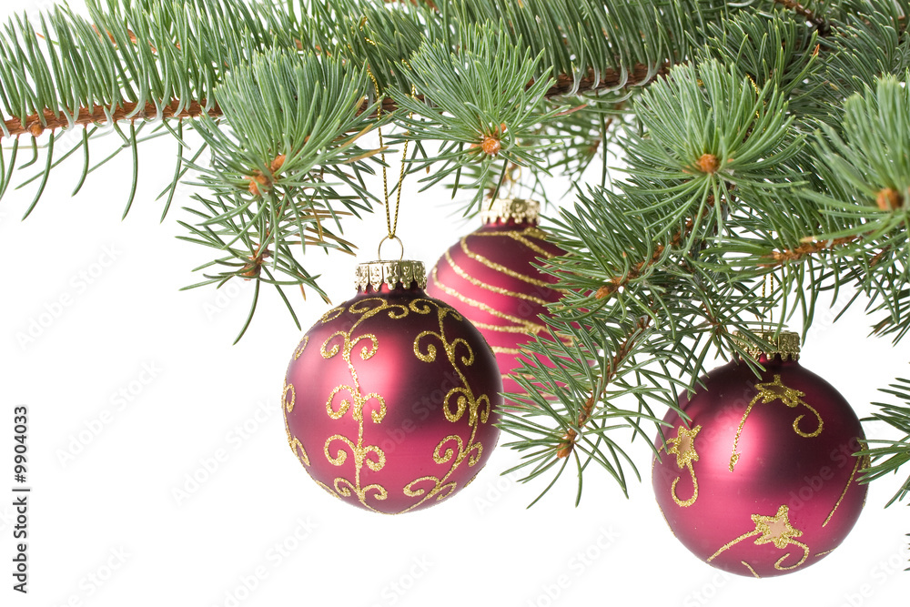 Fir tree branch with decoration on a white background. Fir tree branch with decoration on a white background.