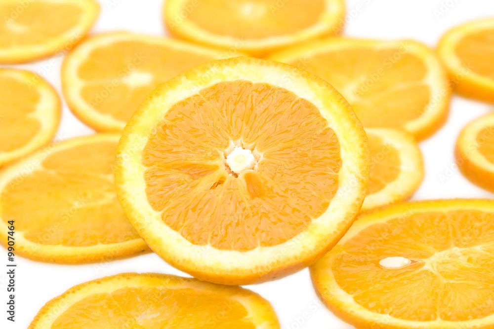 Fresh orange and slices on a white bacground Fresh orange and slices on a white bacground