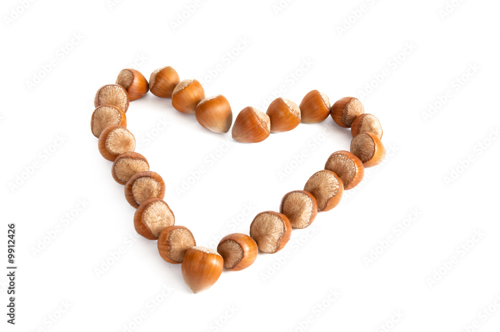 Nuts like as heart isolated on a white background. Nuts like as heart isolated on a white background.