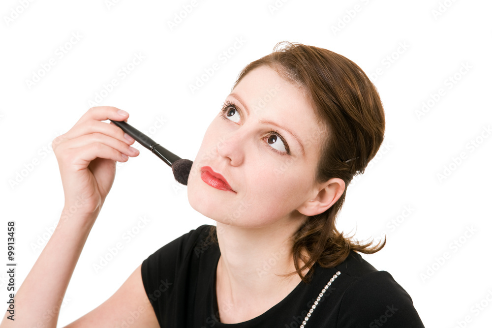 portrait of young beautiful dreaming woman with a cosmetic brush portrait of young beautiful dreaming woman with a cosmetic brush