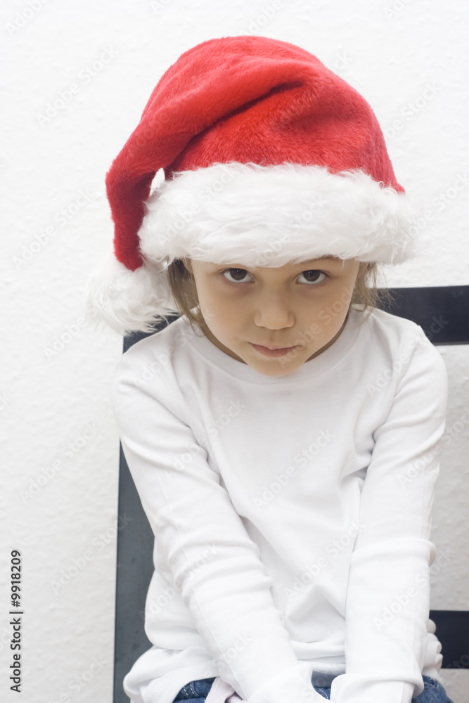 little girl dressed like a santa claus