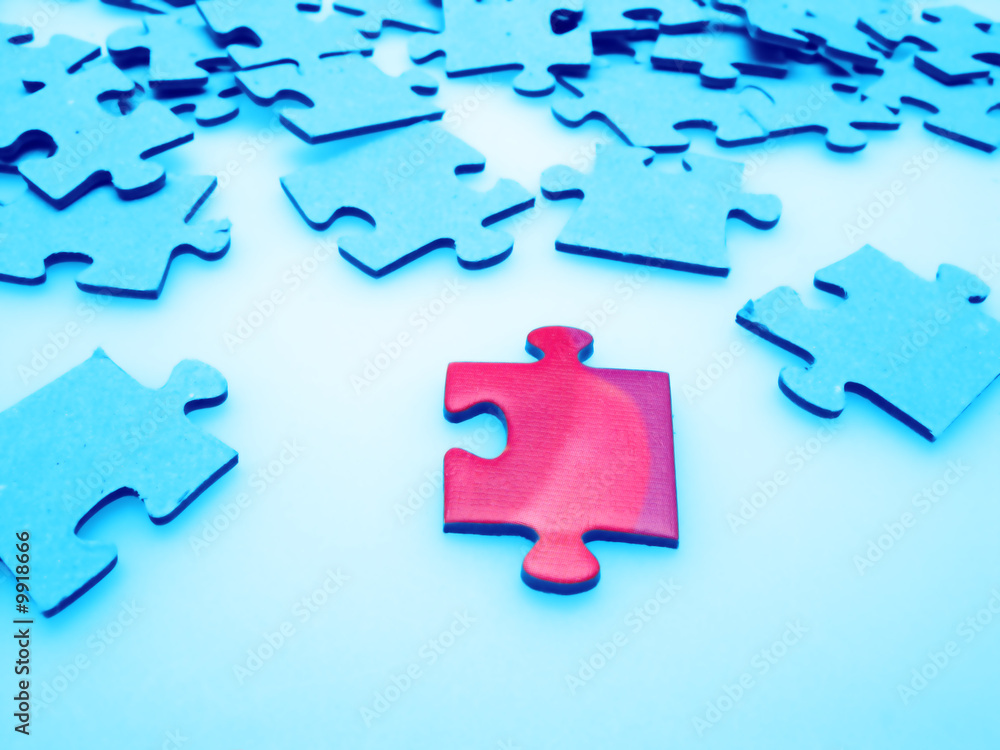 Obraz premium Jigsaw puzzle pieces, closeup