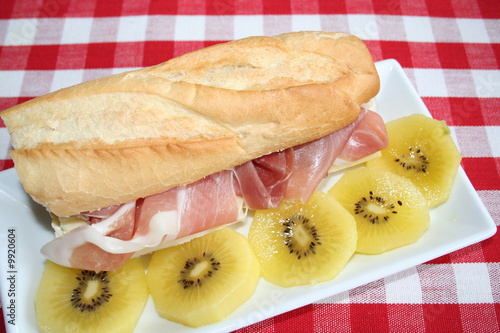 Baguette with Prosciutto ham, cheese and kiwi