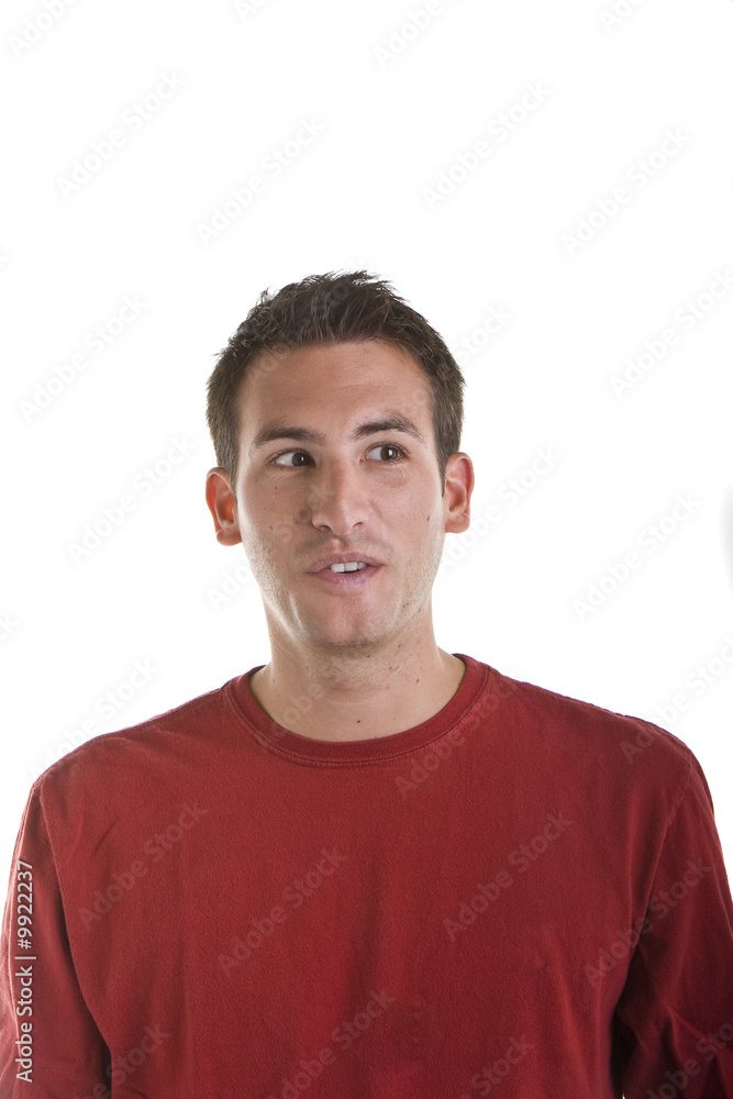 A nice looking young man in a red shirt looking to the left A nice looking young man in a red shirt looking to the left