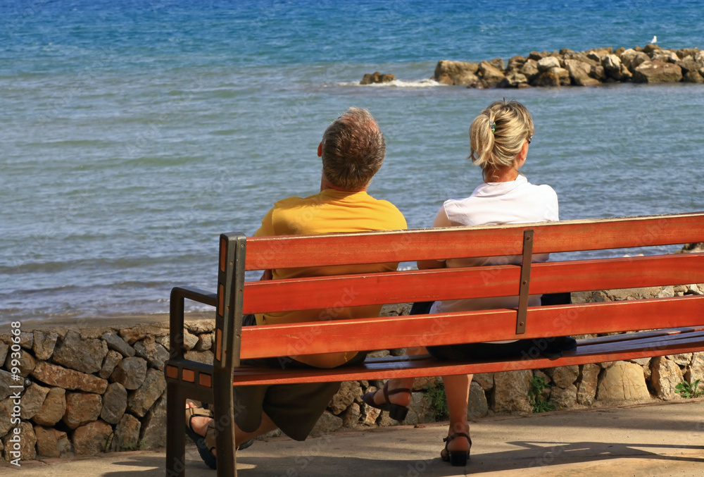 relaxing on bench viewing the ocean relaxing on bench viewing the ocean