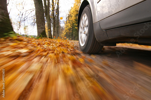 Car driving on country road. photo