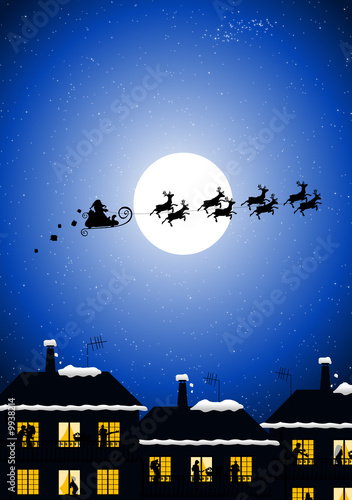 Santa Claus flying over the families in their houses