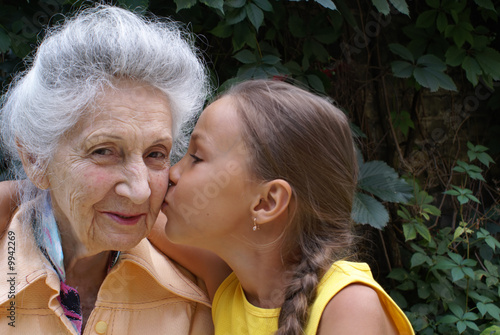 Granddaughter and her grandmother talking