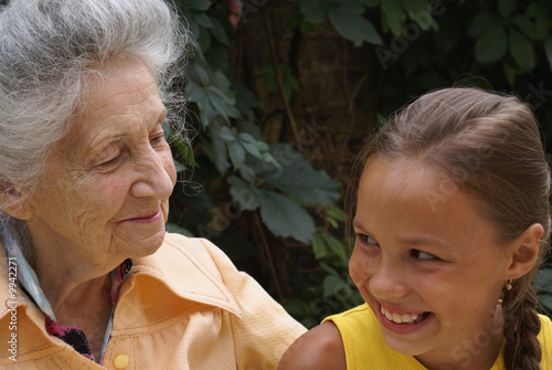 Granddaughter and her grandmother talking