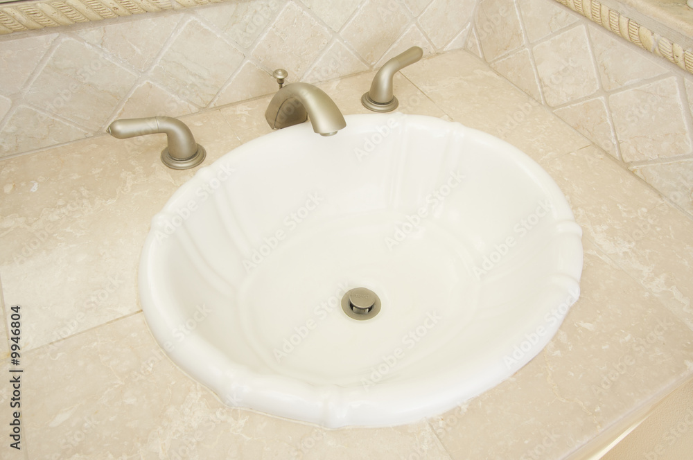 Shell Shaped Sink and Faucet and Tile Counter Shell Shaped Sink and Faucet and Tile Counter