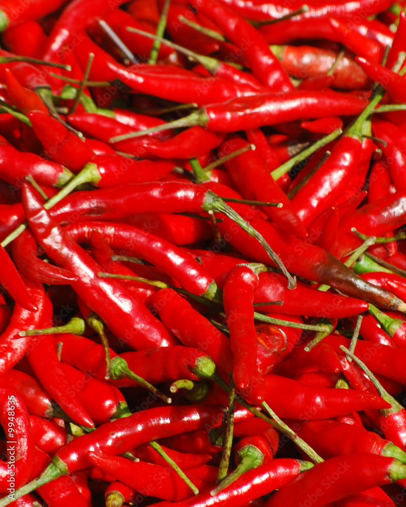 Close-up of red chilli peppers on market stall