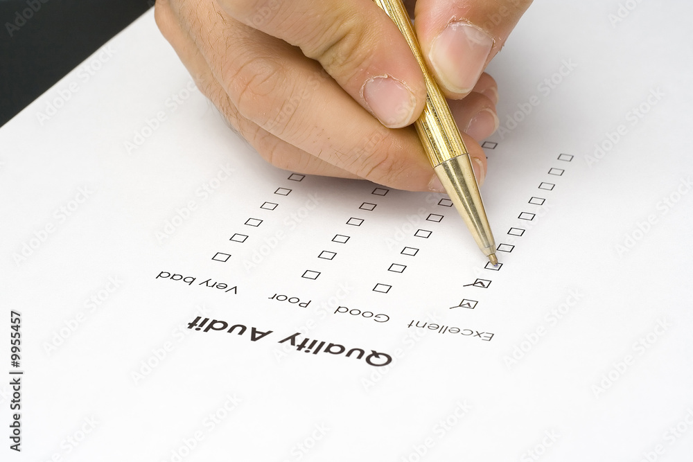 businessman filling out a questionnaire quality of service businessman filling out a questionnaire quality of service