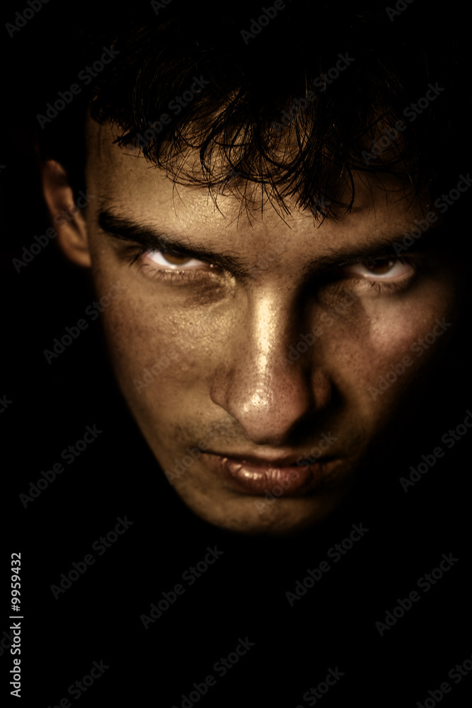 Close up face portrait of evil sinister spooky man