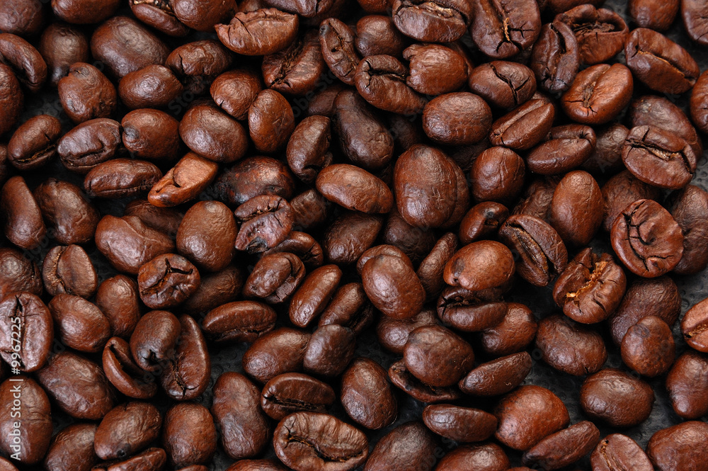 Naklejka premium Coffee Beans on the black background