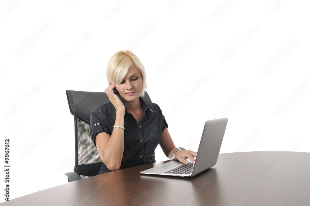 One young business woman working in office on laptop One young business woman working in office on laptop