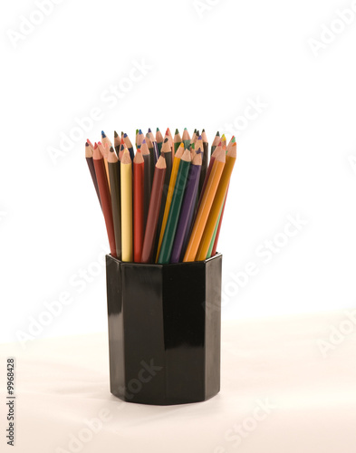 cup with lots of multi-color sharpened pencils