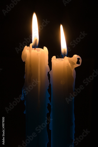 two candles in the dark