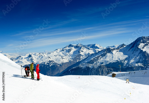 Skiers on the top of the mountain in Meribel Valley