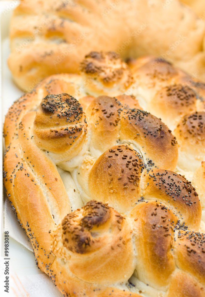 Close up of well cooked bread with sunflower seeds on it Close up of well cooked bread with sunflower seeds on it