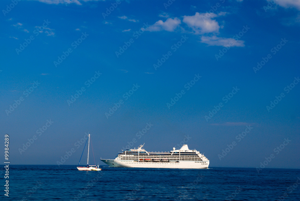 sea landscape with yacht and cruise liner