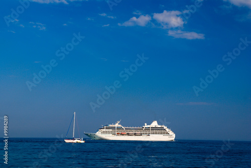 sea landscape with yacht and cruise liner © Alexey Repka