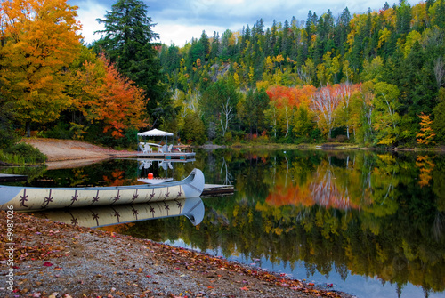 Принти на полотні Fall colors in Canada's Algonquin Park reflected on a lake