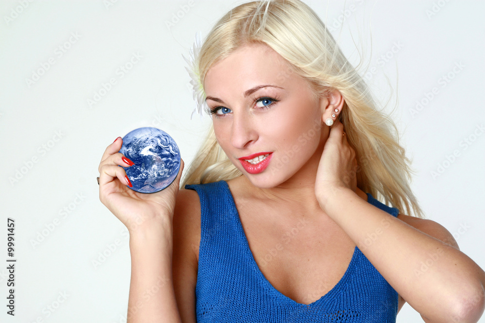 Beautiful sexy blonde with earth in hands Beautiful sexy blonde with earth in hands