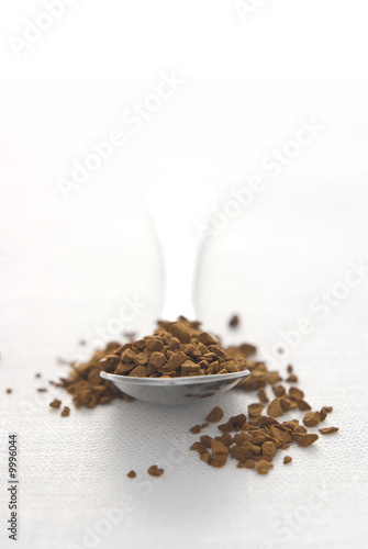 Coffee spoon loaded with granules.