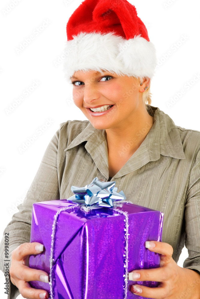 eine junge frau mit einer weihnachtsmütze und einem geschenk eine junge frau mit einer weihnachtsmütze und einem geschenk