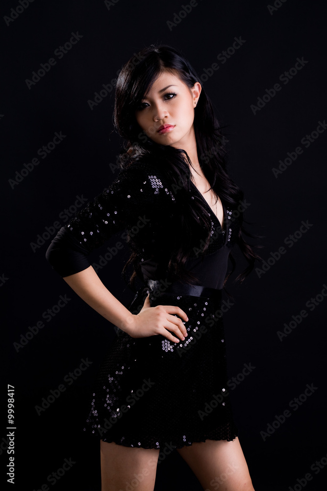 beautiful asian girl in a beautiful black dress