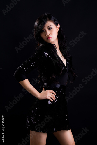 beautiful asian girl in a beautiful black dress