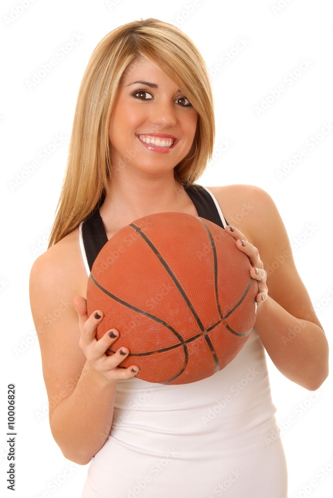 lovely isolated blond girl with a basketball lovely isolated blond girl with a basketball
