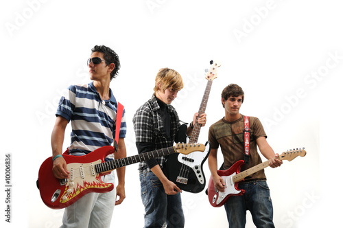 Trendy group of teenagers with musical instruments © roxxyphotos