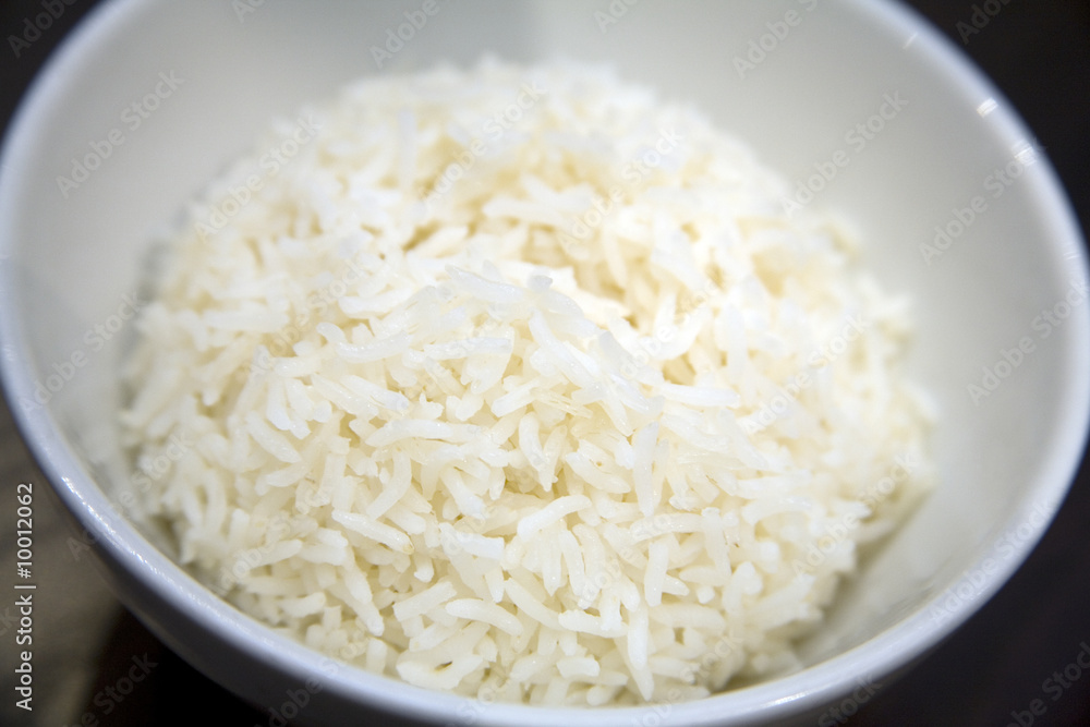 Basmati rice in a white rice bowl Basmati rice in a white rice bowl