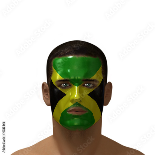 Portrait of a male with a Jamaican flag painted on his face. photo