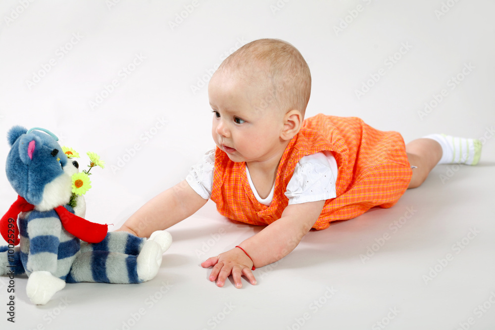 An image of cute baby in a studio An image of cute baby in a studio