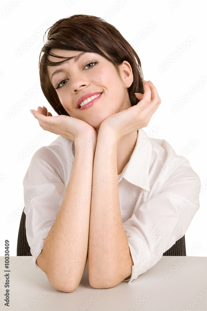 A portrait of a beautiful smiling young brunette. A portrait of a beautiful smiling young brunette.