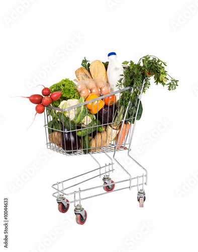 Healthy food - groceries in shopping cart - isolated