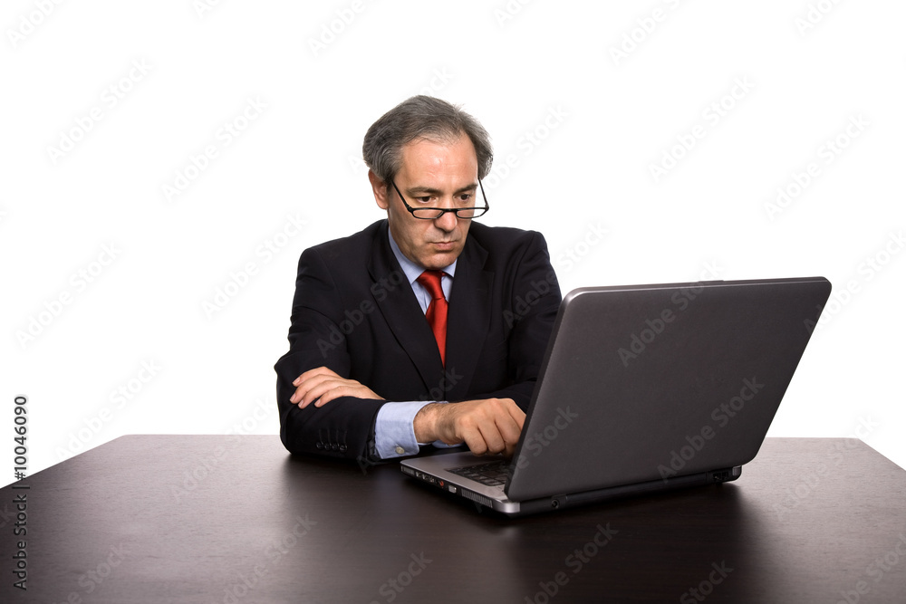 mature business man working with his laptop