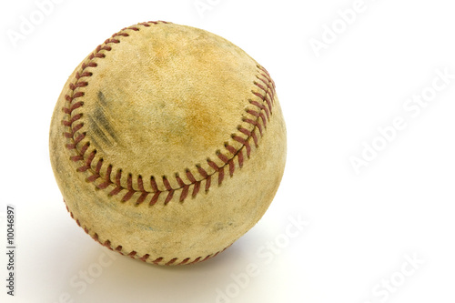 Old baseball with scuff marks and a clipping path