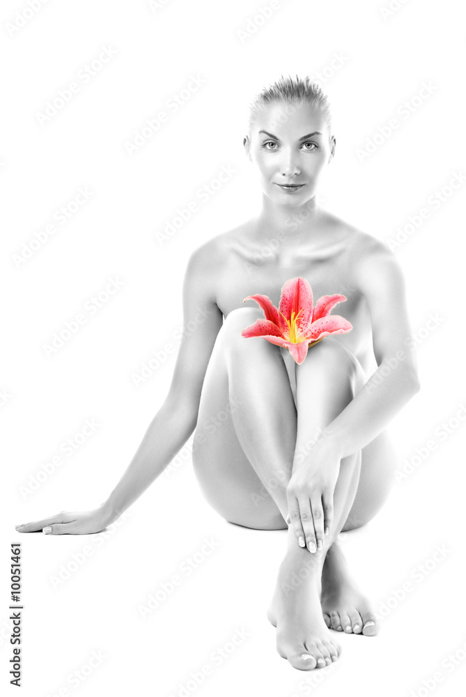 Naklejka premium Beautiful young woman with pink lily flower