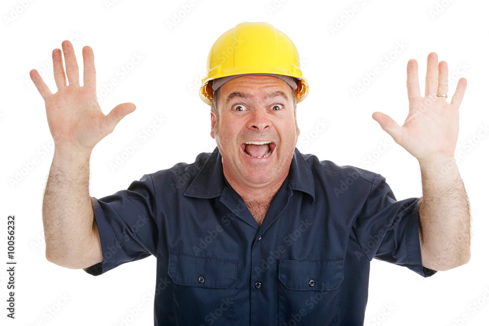 Construction worker screaming in terror.  Isolated on white.